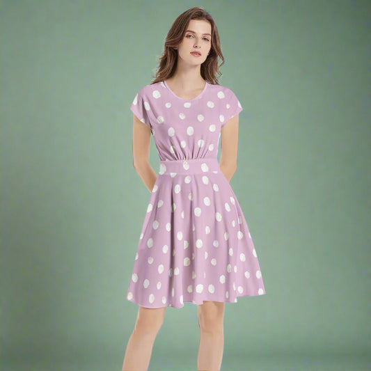 Step out in style with our Pink Dot A-Line Midi Dress! Featuring a flattering silhouette and playful polka dots, it’s perfect for any occasion