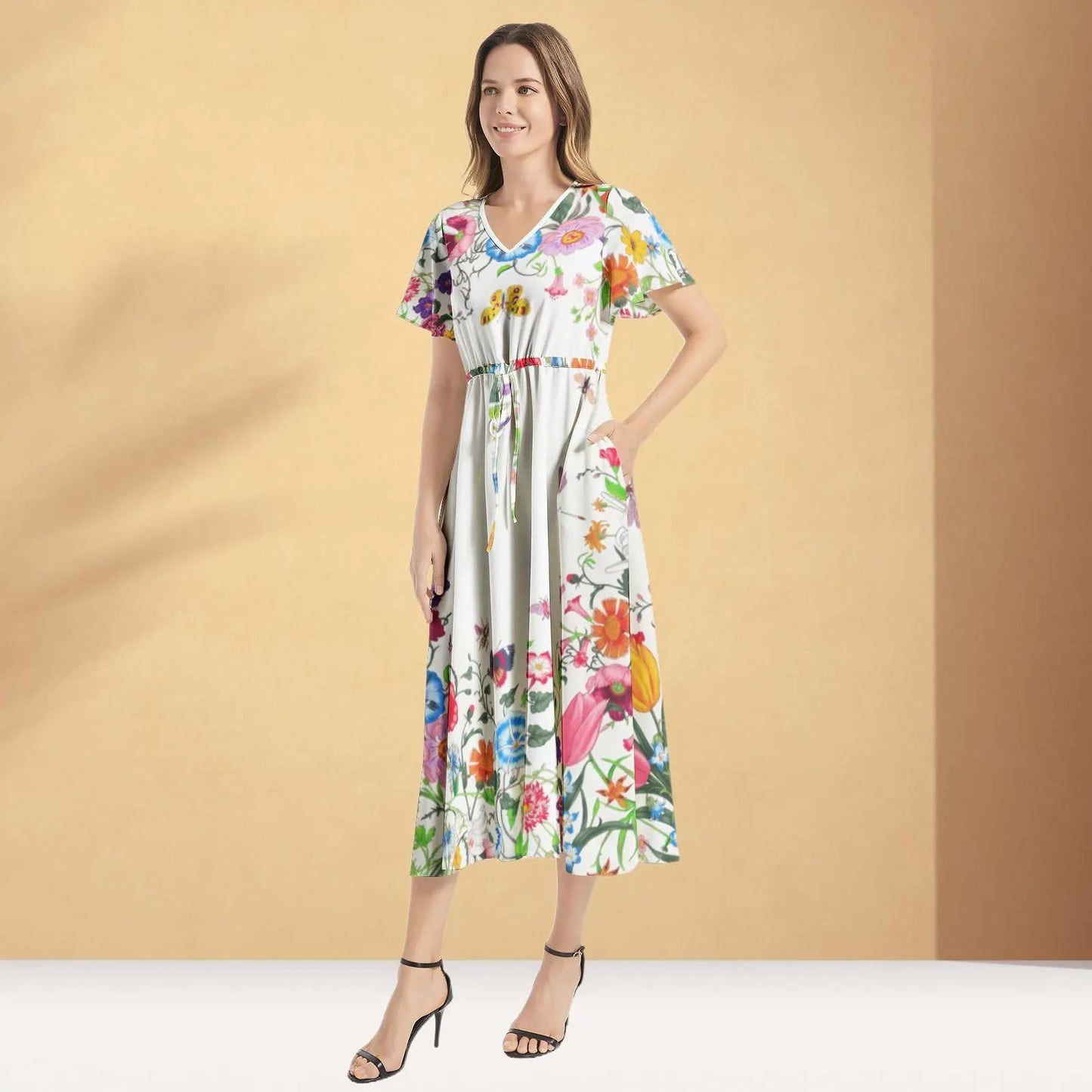 Luxurious floral Gucci print maxi dress, featuring a bold, vibrant pattern and flowing silhouette, perfect for making a stylish statement at any occasion.