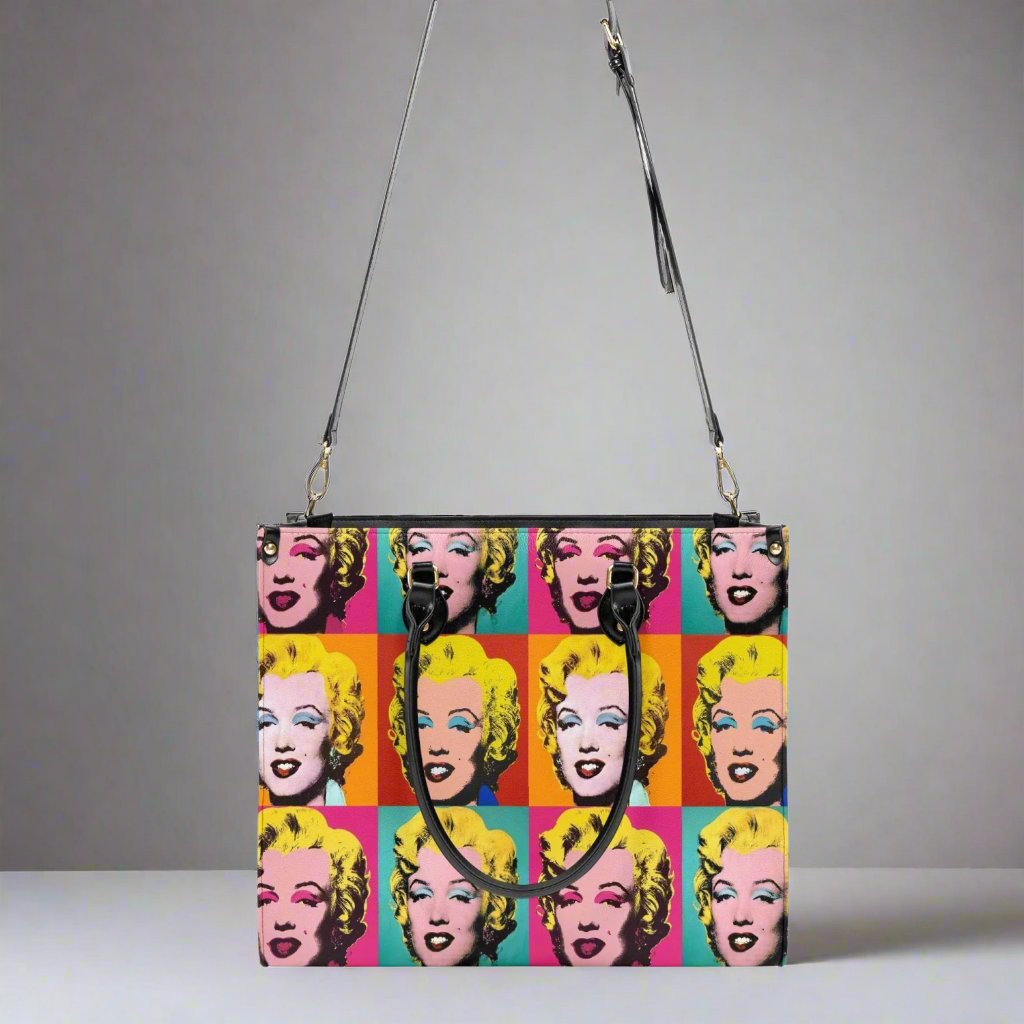 Andy Warhol Marilyn Monroe Vegan Leather Tote Bag displayed against a vibrant background for artistic flair.