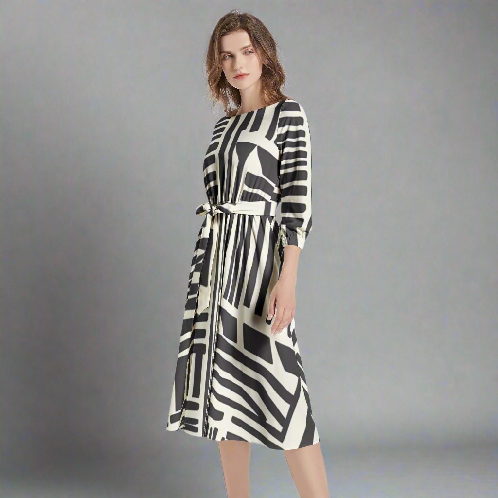 Back view of the Black & White Geometrical Tribal Print Belted Dress highlighting the stylish belted waist.