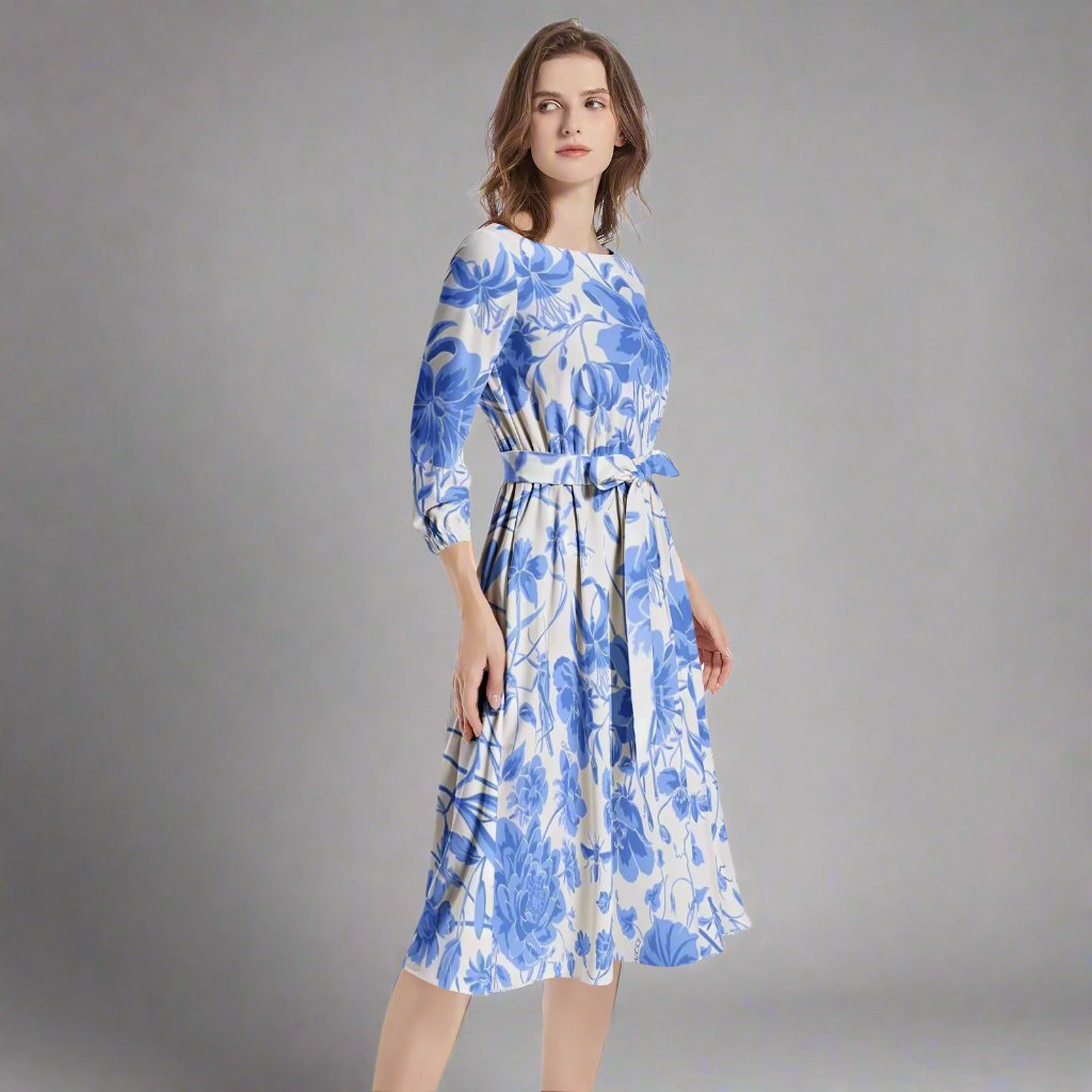 Close-up detail of the floral print on the Blue Floral Midi Dress.