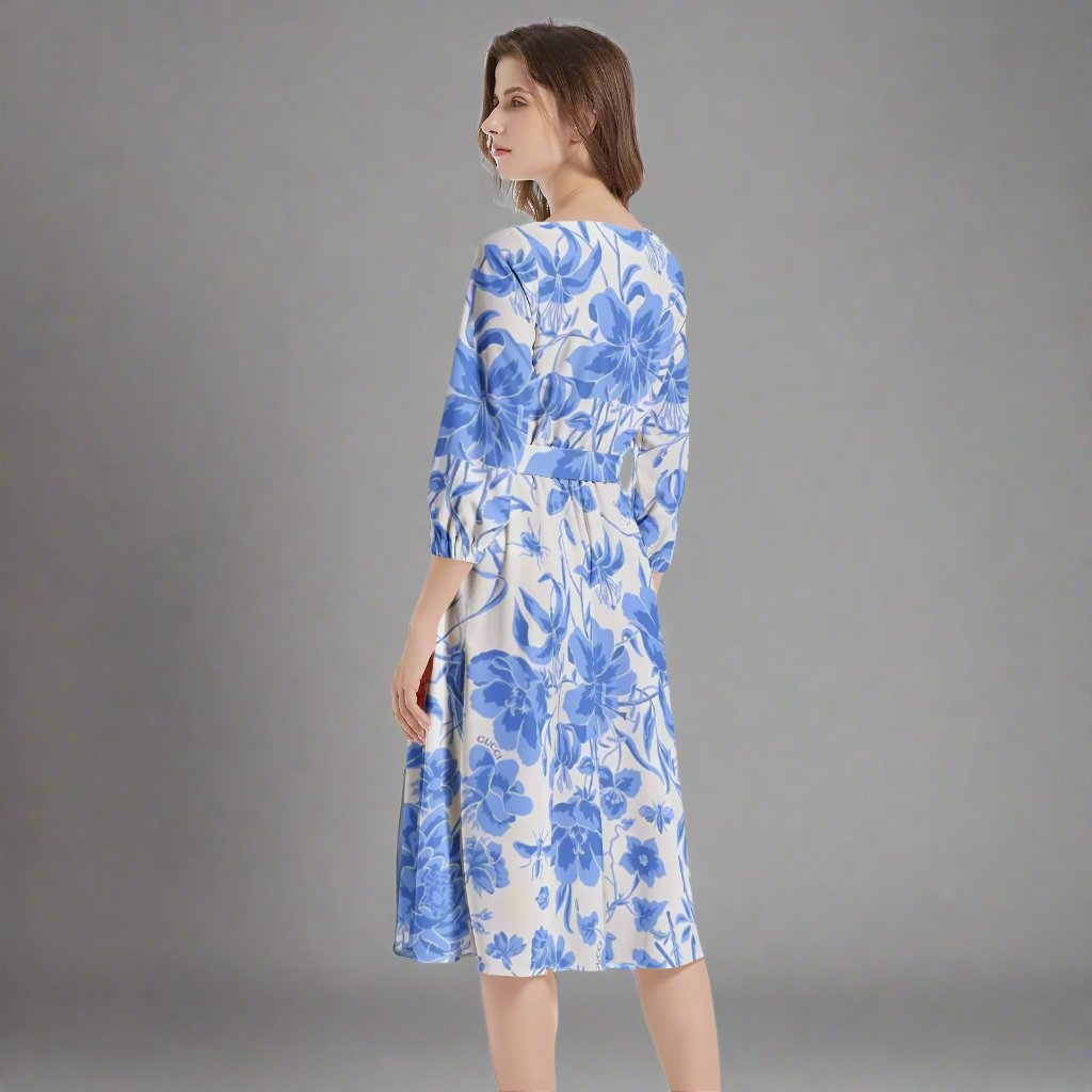 Model wearing the Blue Floral Midi Dress styled for a chic summer look