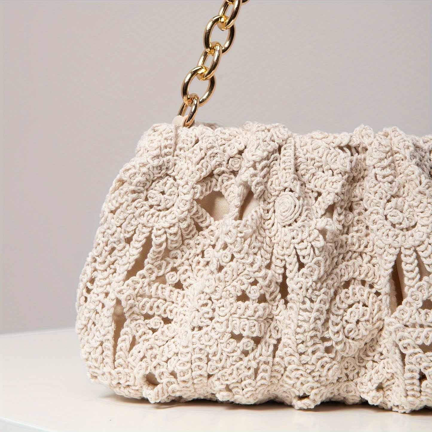 Elevate your accessory game with our Geometric Pattern Boho Crochet Shoulder Bag. Handmade and perfect for eco-conscious fashion lovers!