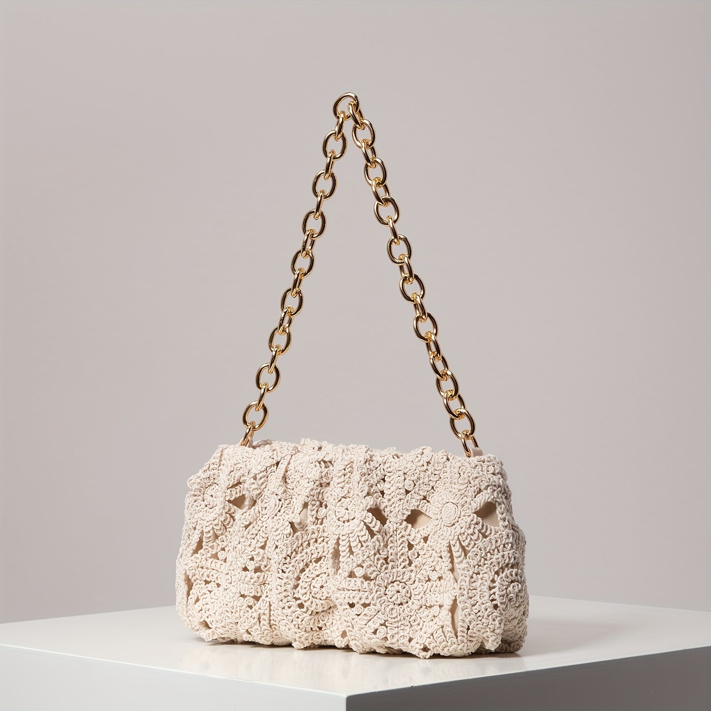 Discover the Boho Crochet Shoulder Bag with a stunning geometric pattern. Handcrafted and stylish, perfect for any bohemian outfit!