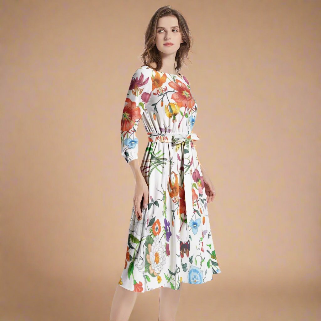 Close-up detail of the fabric and colorful floral print on the Colorful Floral Print Belted Dress.