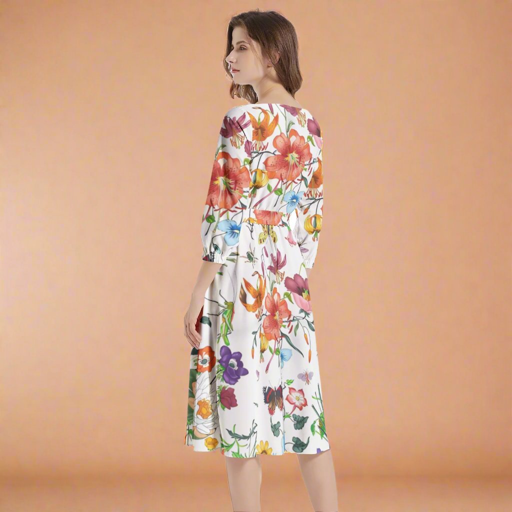 Model wearing the Colorful Floral Print Belted Dress styled for a summer wedding.