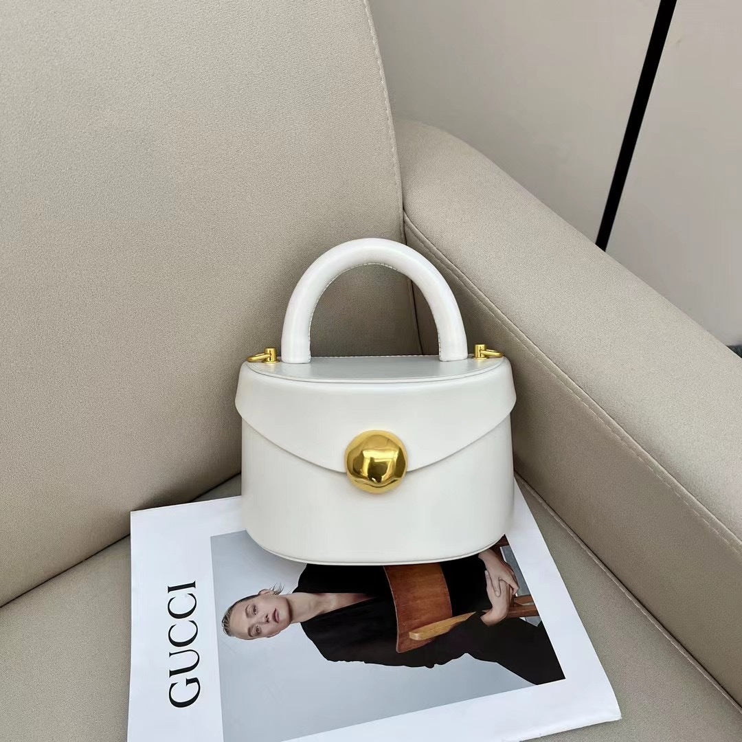 Make a statement with our Premium Leather Semicircle Box Bag, featuring a modern silhouette and luxurious leather finish, ideal for any wardrobe.