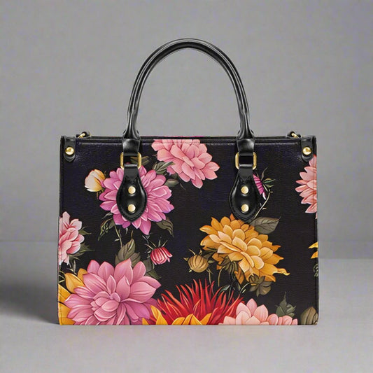 Flat lay of the Flora Print Tote Bag styled with accessories, showcasing its vibrant floral design.