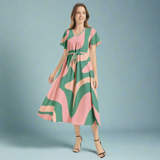 Front view of the Green & Pink 60s Retro Maxi Dress showcasing its vibrant retro print.