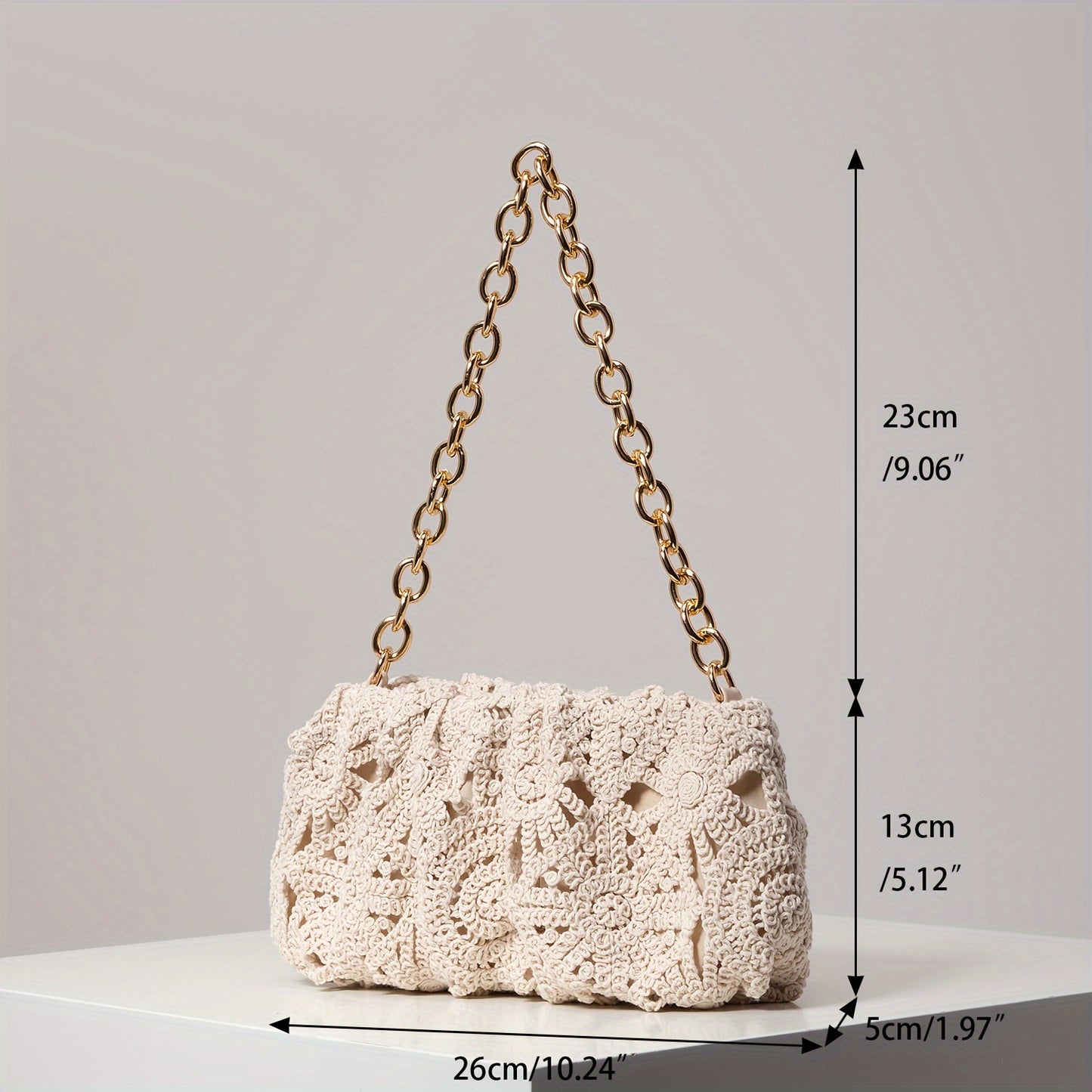 Explore the beauty of handcrafted fashion with our Boho Crochet Shoulder Bag, showcasing a stylish geometric pattern for the modern bohemian