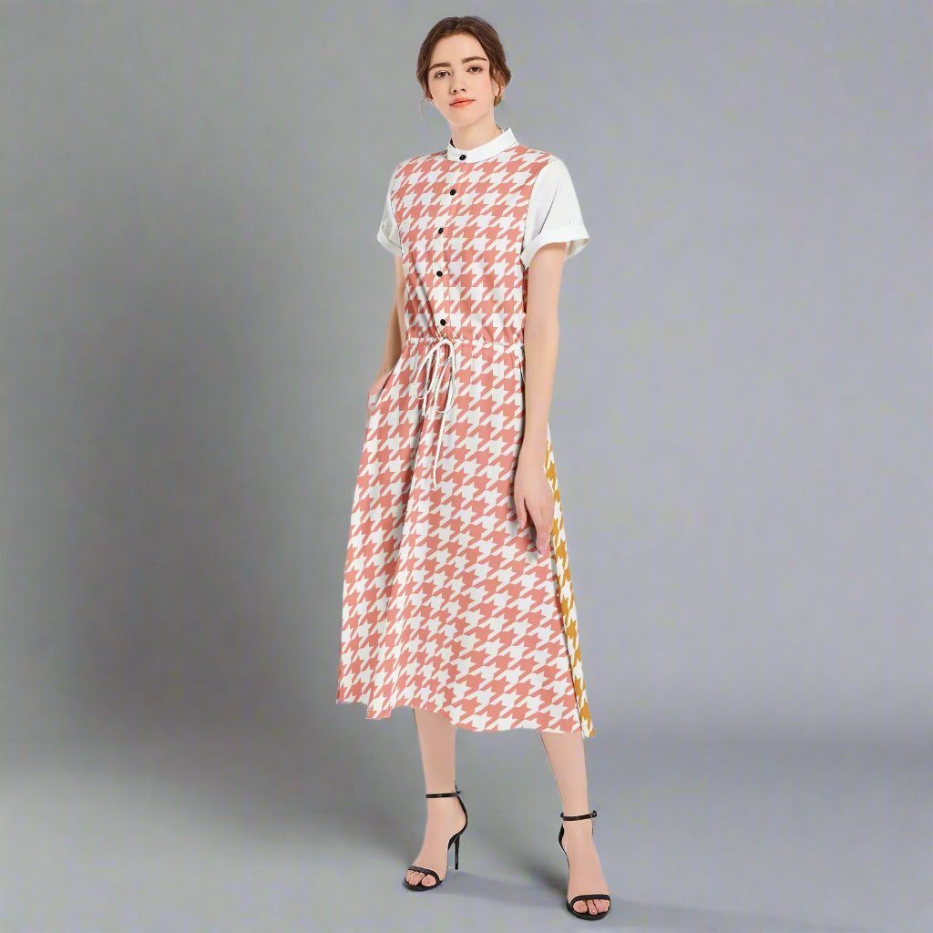 Back view of the Houndstooth Yellow and Pink Flared Midi Dress with zipper detail and elegant flow