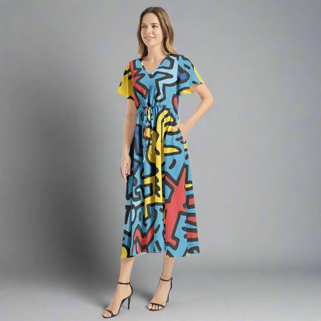 Back view of the Keith Haring Blue Maxi Dress featuring a unique design and flowy skirt