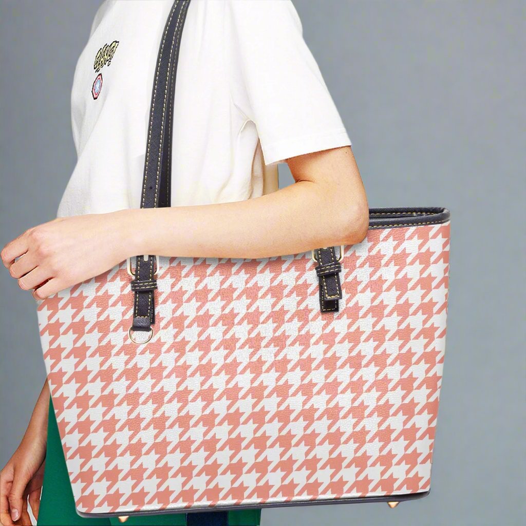 Close-up of the Large Pink Houndstooth Tote Bag's fabric, showcasing the unique houndstooth pattern and texture