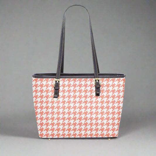 Front view of the Large Pink Houndstooth Vegan Leather Tote Bag showcasing a vibrant pink houndstooth pattern.