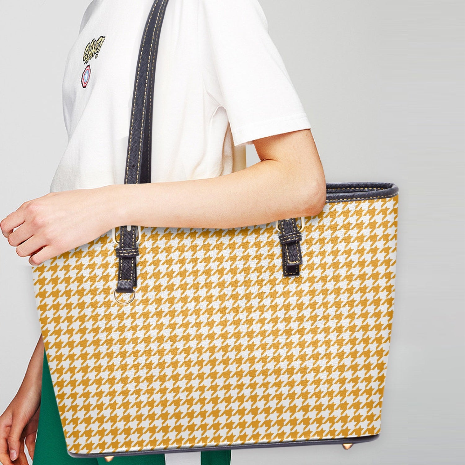 Close-up of the Large Yellow Houndstooth Tote Bag's fabric, showcasing the unique houndstooth pattern and texture