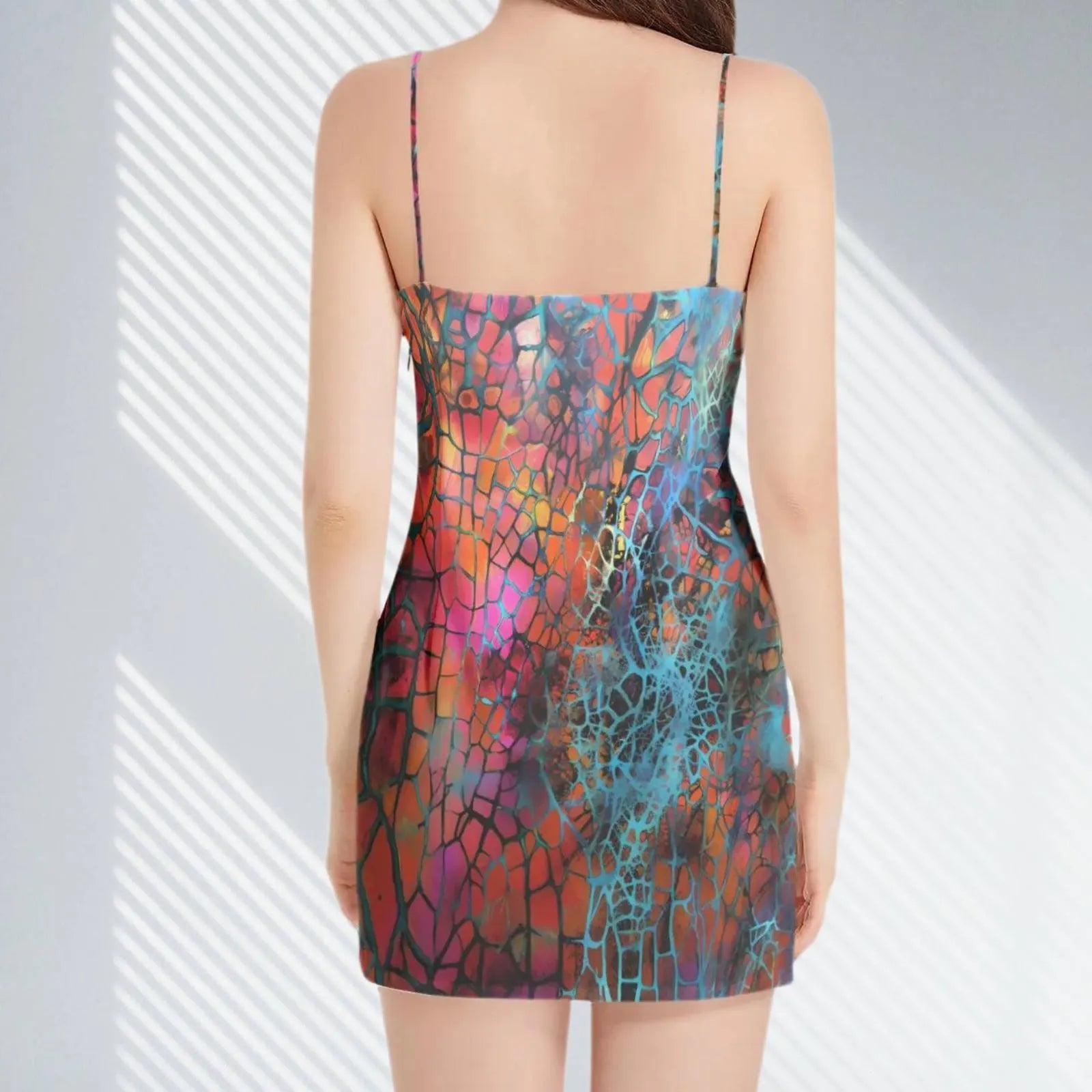 Side profile of the Neo Snake Skin Mini Dress, emphasizing its flattering shape.