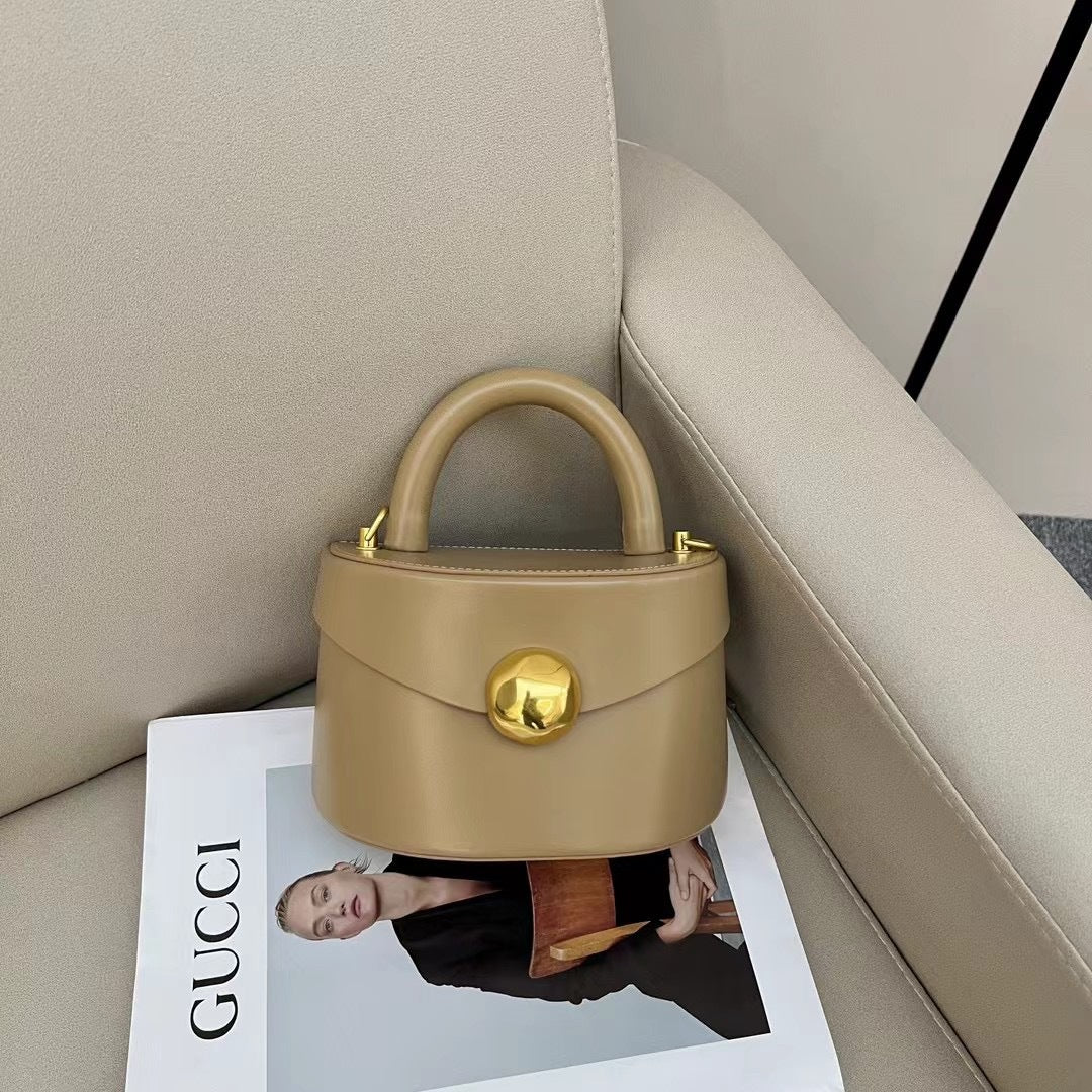 Our Premium Leather Semicircle Box Bag combines unique design with high-quality materials, perfect for adding a touch of sophistication to your outfit.