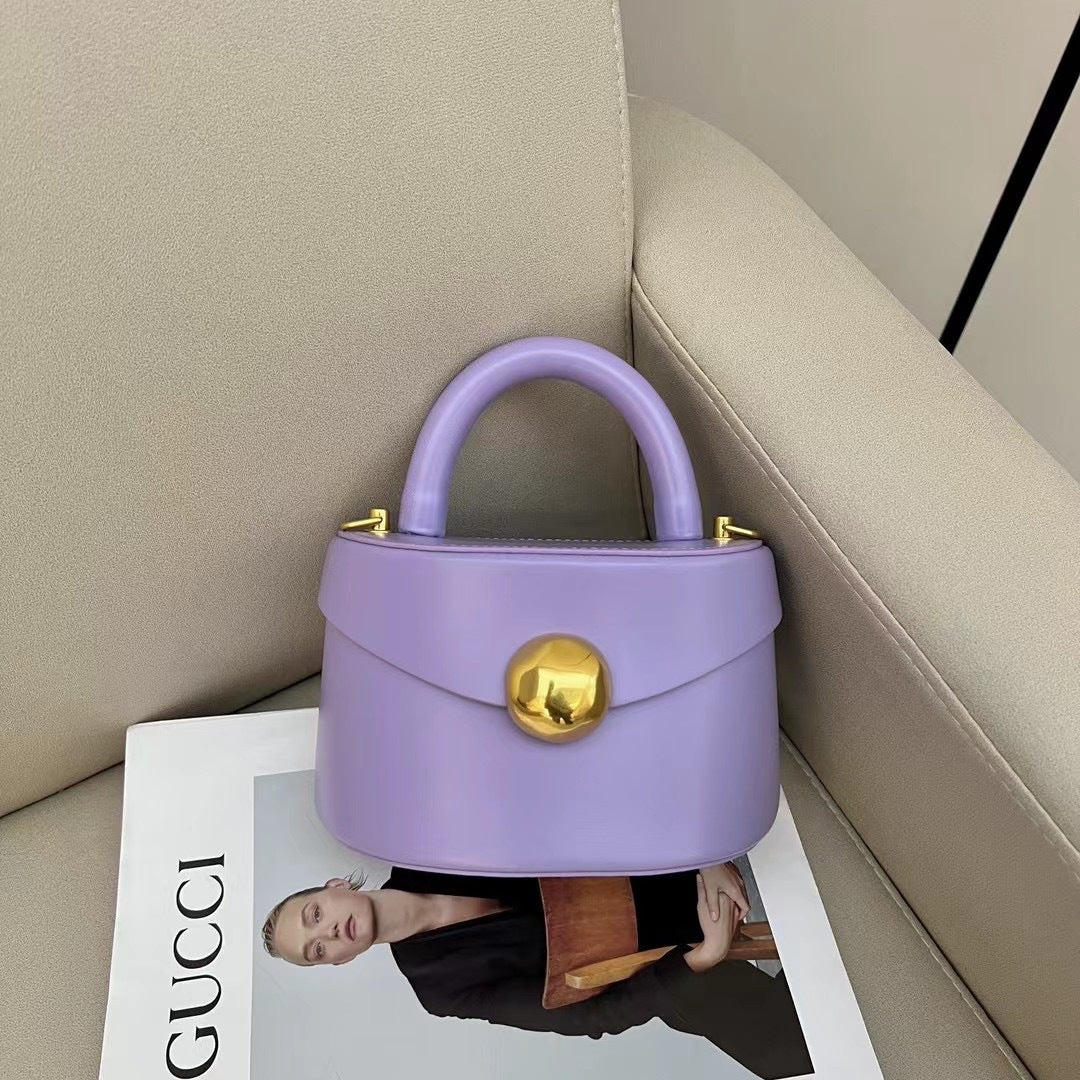 Discover the elegance of our Premium Leather Semicircle Box Bag. Its unique design and premium craftsmanship make it a must-have for fashion lovers