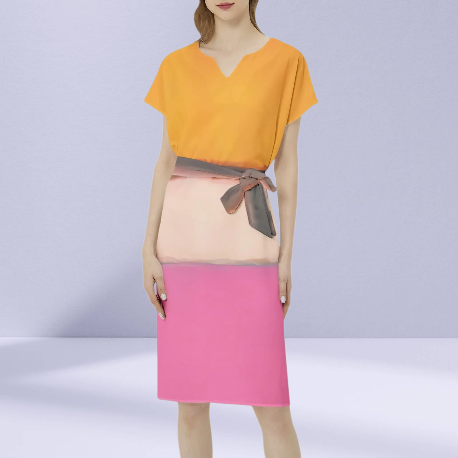 "Close-up of the Rothko Orange Pink Dress's fabric, showcasing the quality and color details.