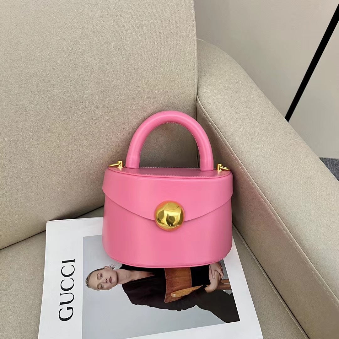 Find your new favorite accessory with our Premium Leather Semicircle Box Bag, featuring a distinctive shape and premium leather for a chic look