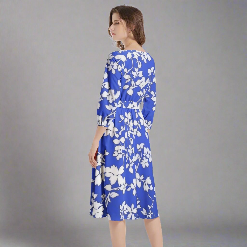 Back view of the Violet Blue Floral Midi Dress featuring a chic design.