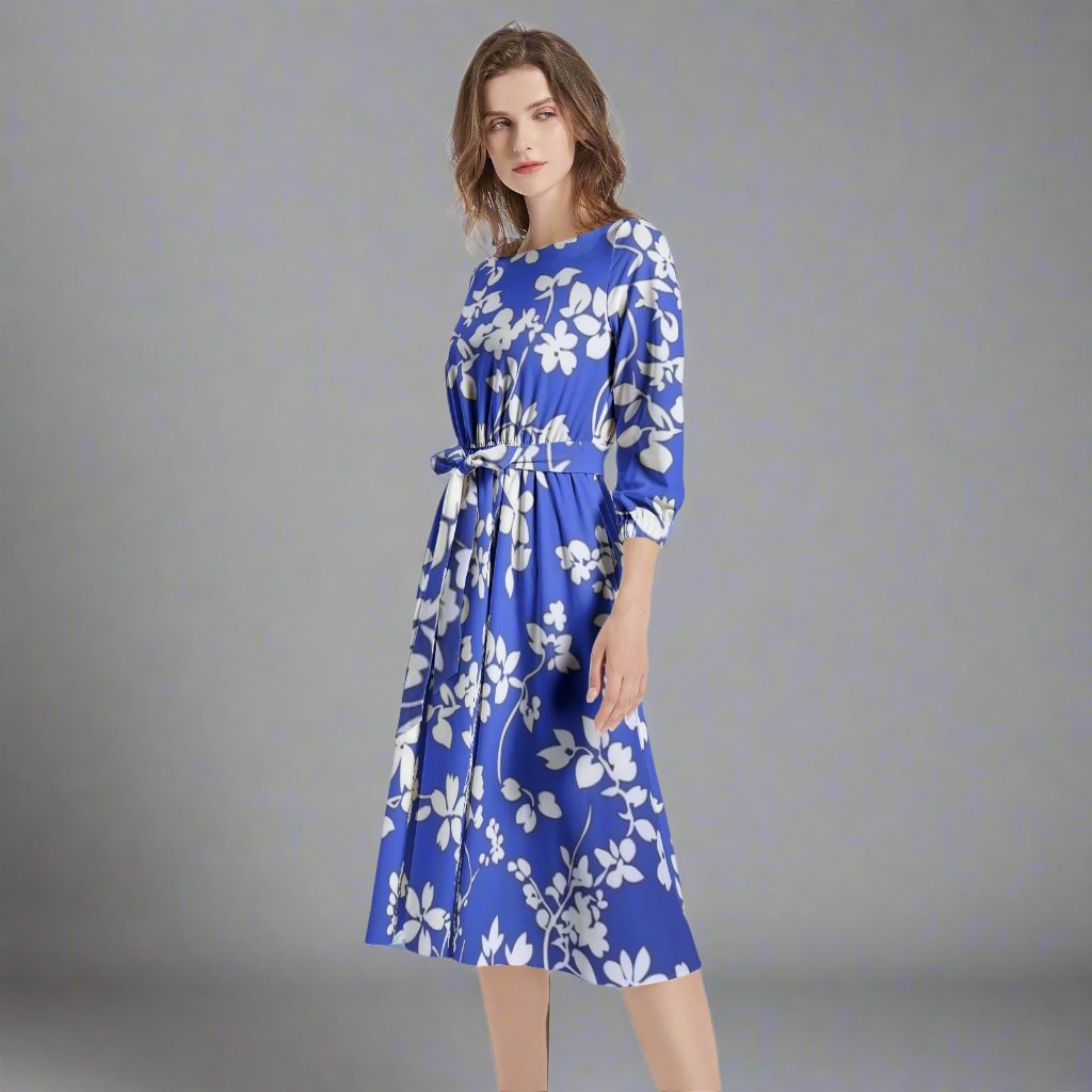 Side profile of the Violet Blue Floral Midi Dress, emphasizing its flattering fit.