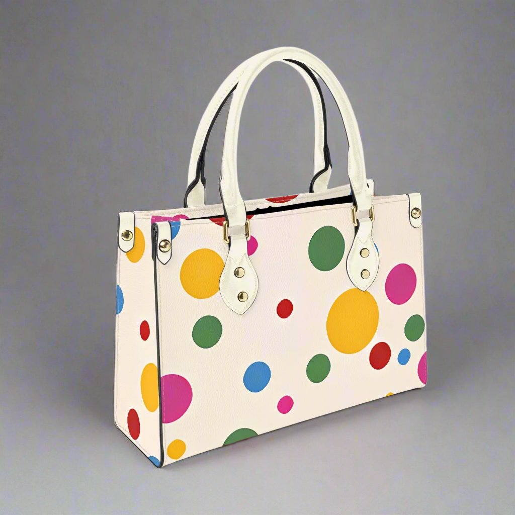 Rainbow Yayoi Kusama Tote Bag with colorful polka dots.