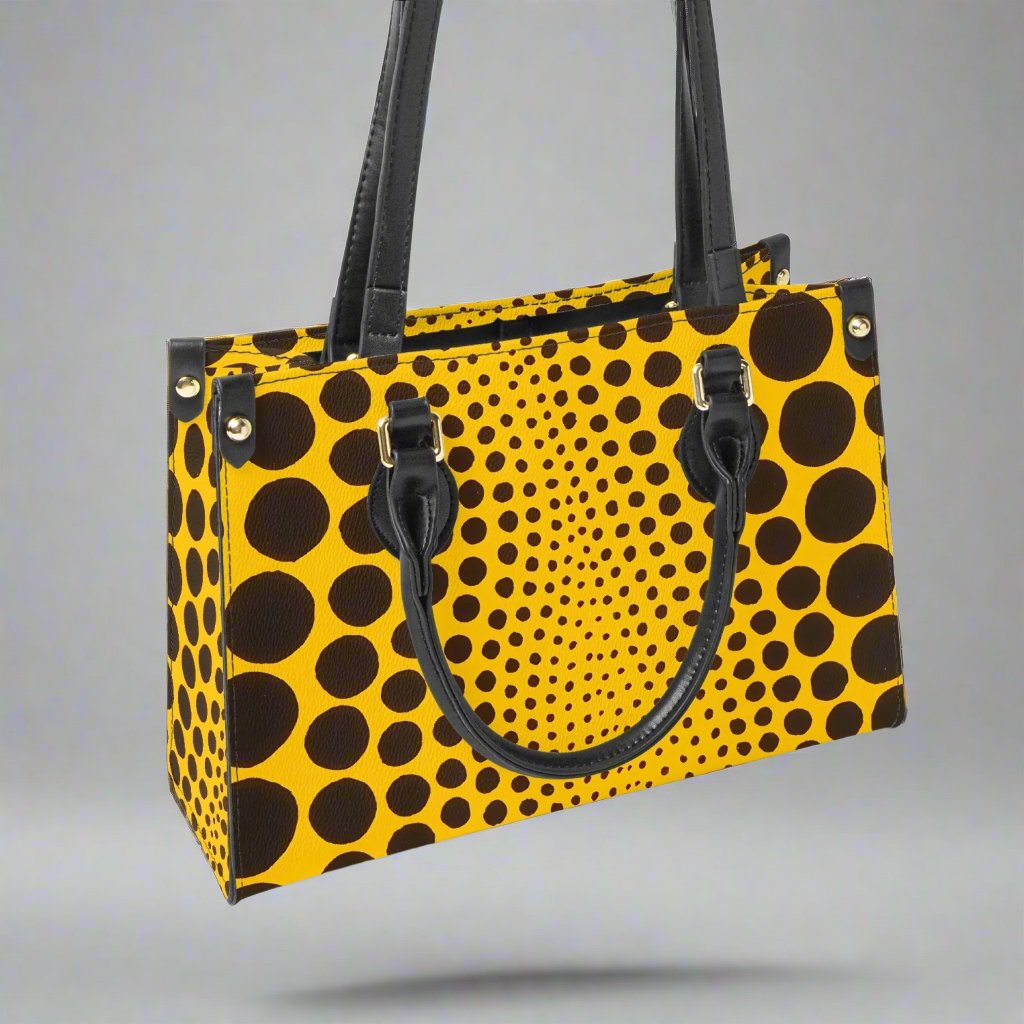 Back view of the Yayoi Kusama Yellow Dot Tote Bag featuring a smooth finish