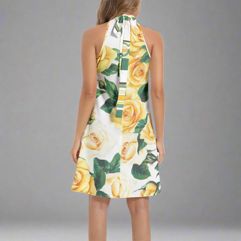 Side view of the Yellow Rose Flared Dress emphasizing its graceful flow.