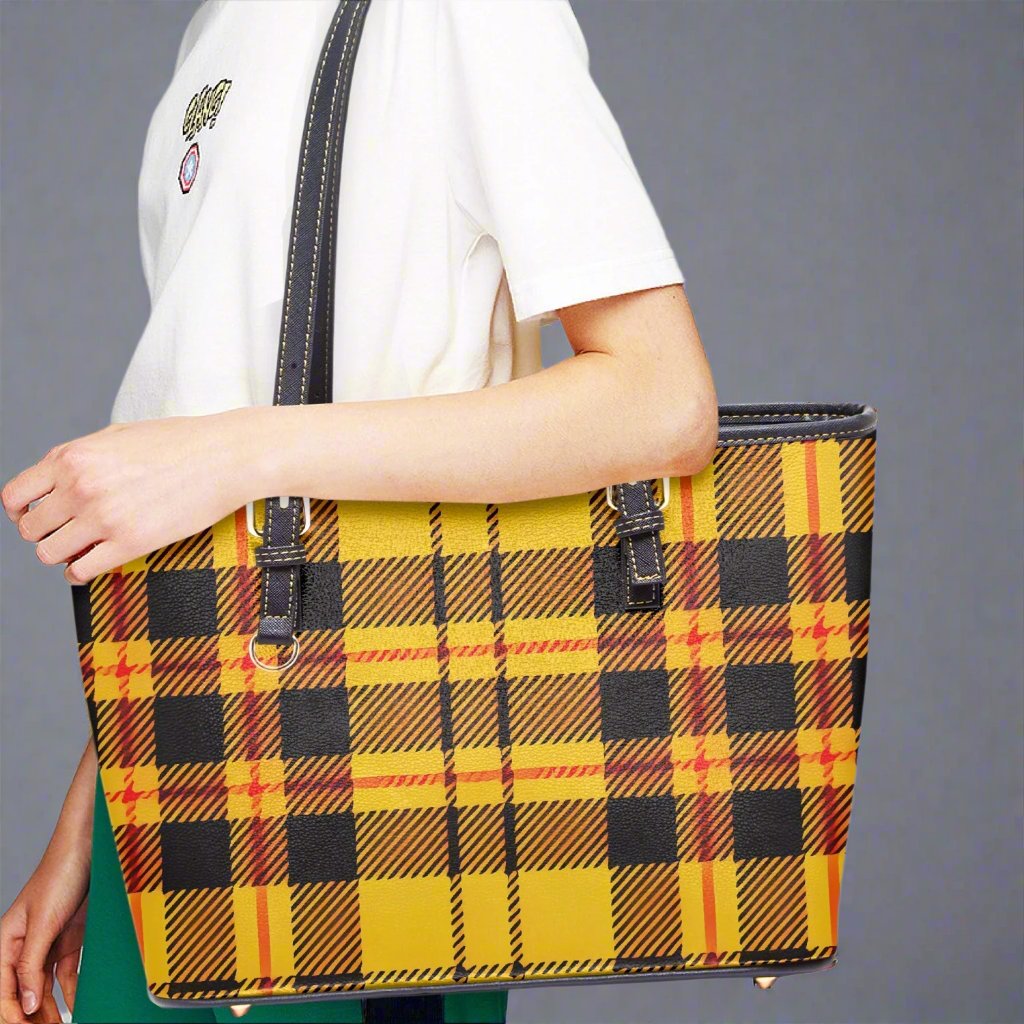 Close-up of the Yellow Tartan Large Vegan Leather Tote Bag's fabric, showcasing quality and print details.